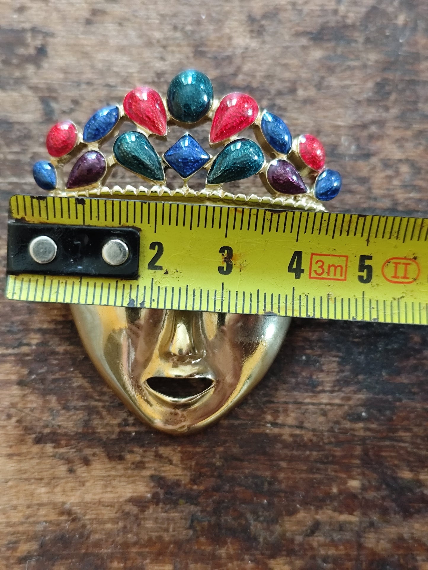 Broche vintage masque doré ornée de perles