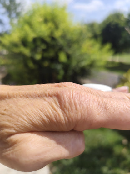 Bague ovale blanche réglable