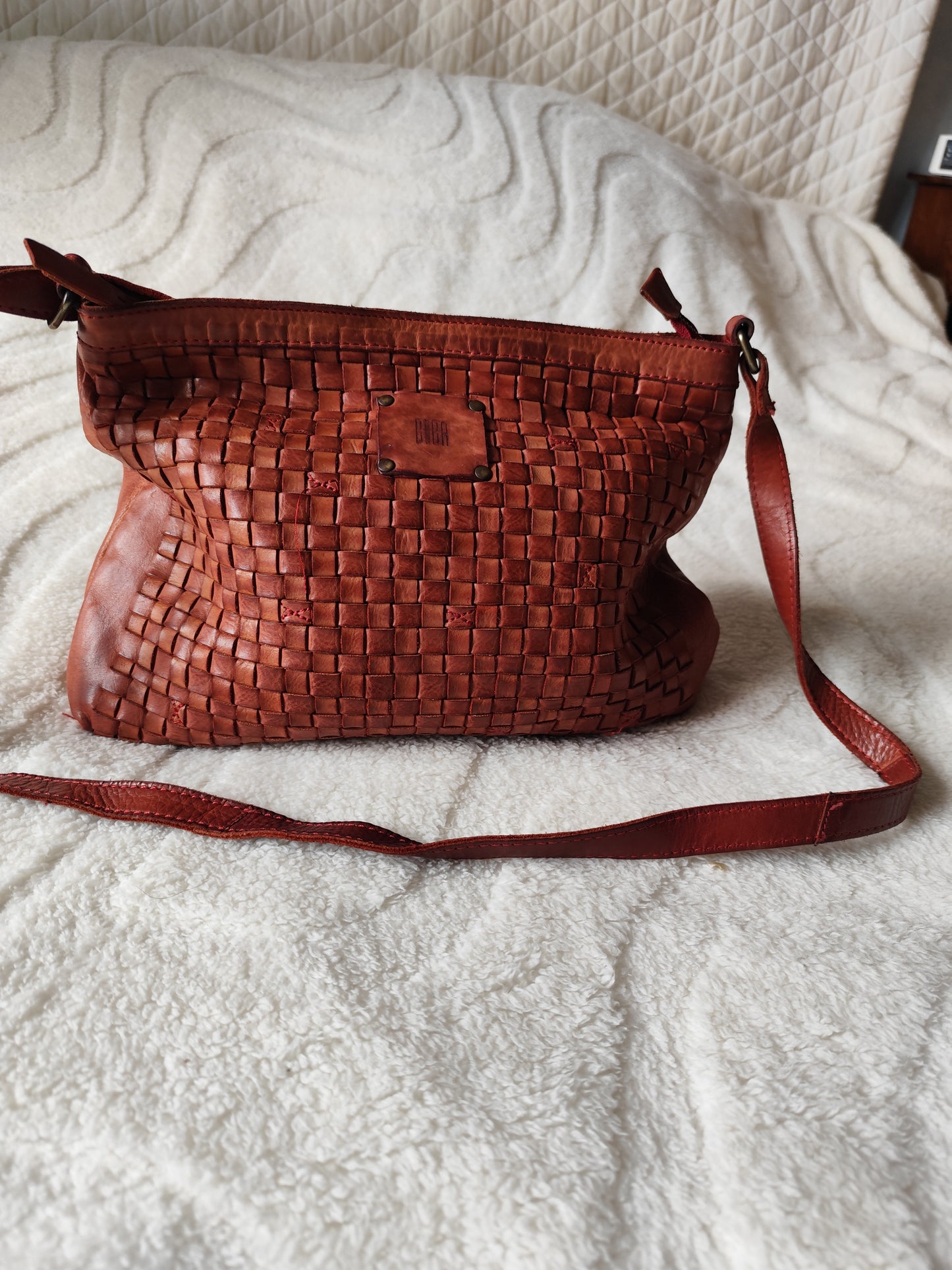 Sac bandoulière Biba en cuir tressé marron