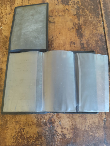 Portefeuille noir en cuir à volets multiples