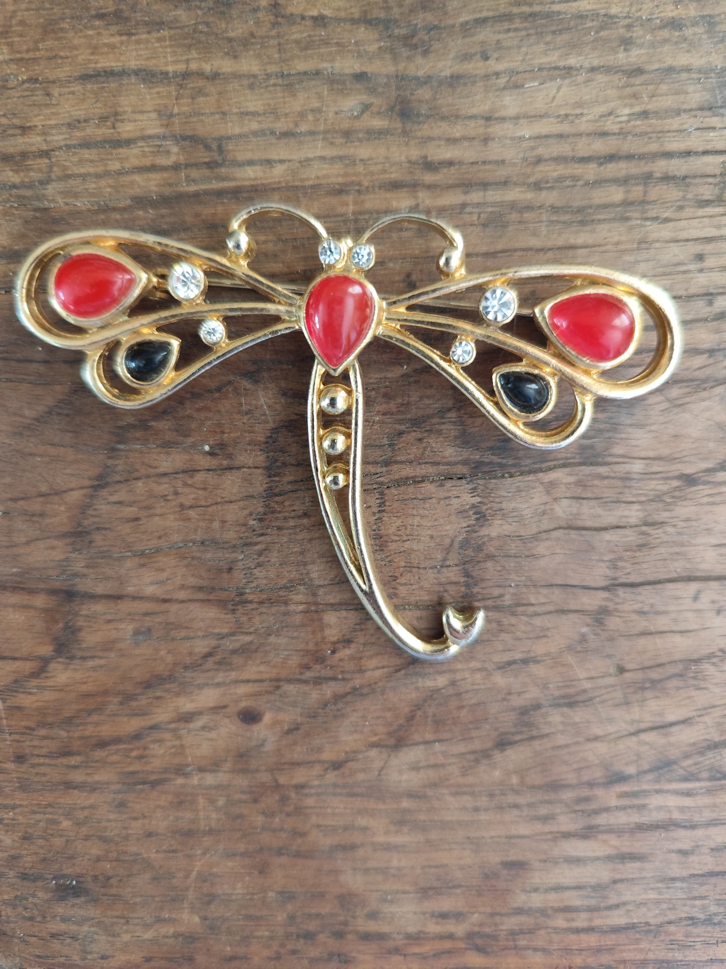 Grande broche libellule dorée émail rouge et noire