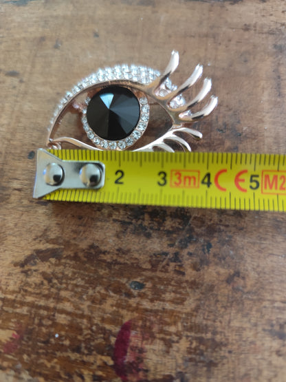 Broche vintage œil surréaliste dorée strass et larme pendante