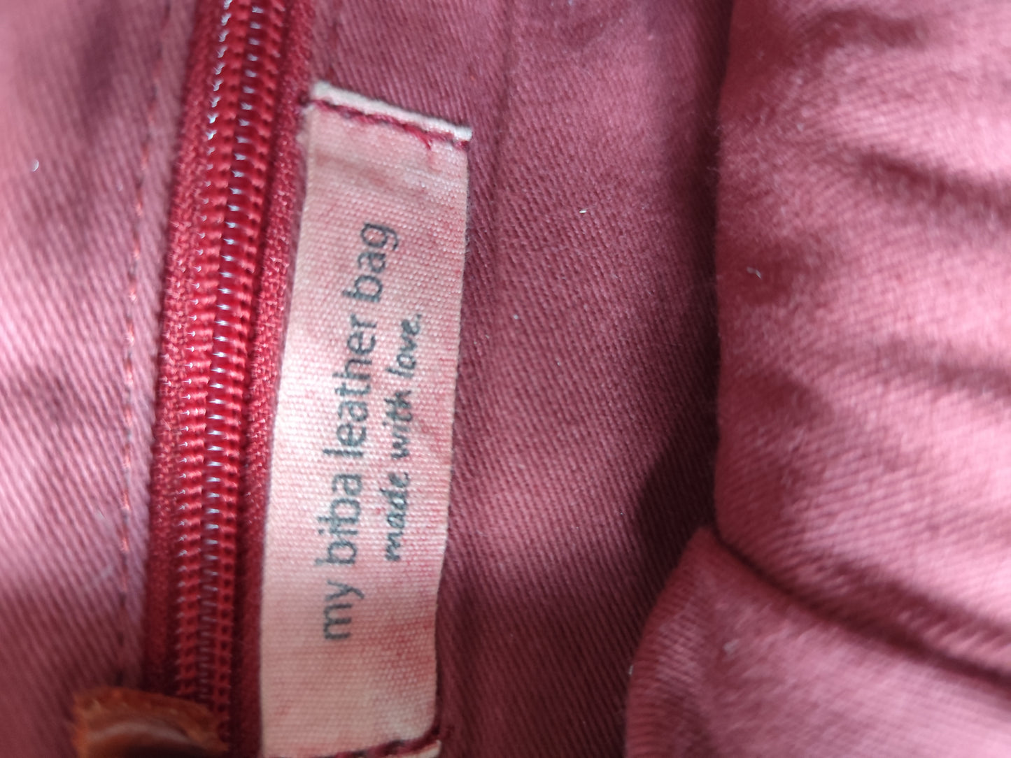 Sac bandoulière Biba en cuir tressé marron