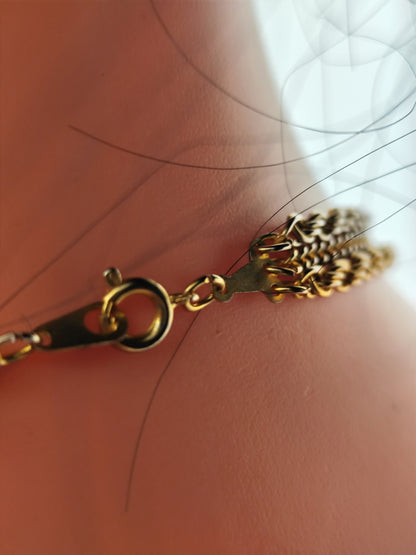 Collier multirangs perles et chaînes dorées