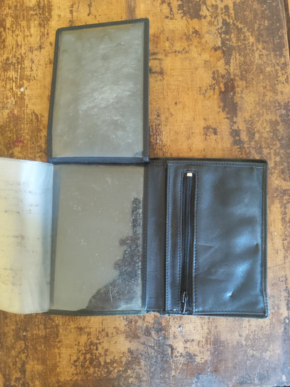 Portefeuille noir en cuir à volets multiples