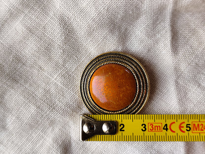 Attache foulard doré émaillé ambre