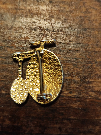 Broche vintage vélo grand-bi dorée et nacrée