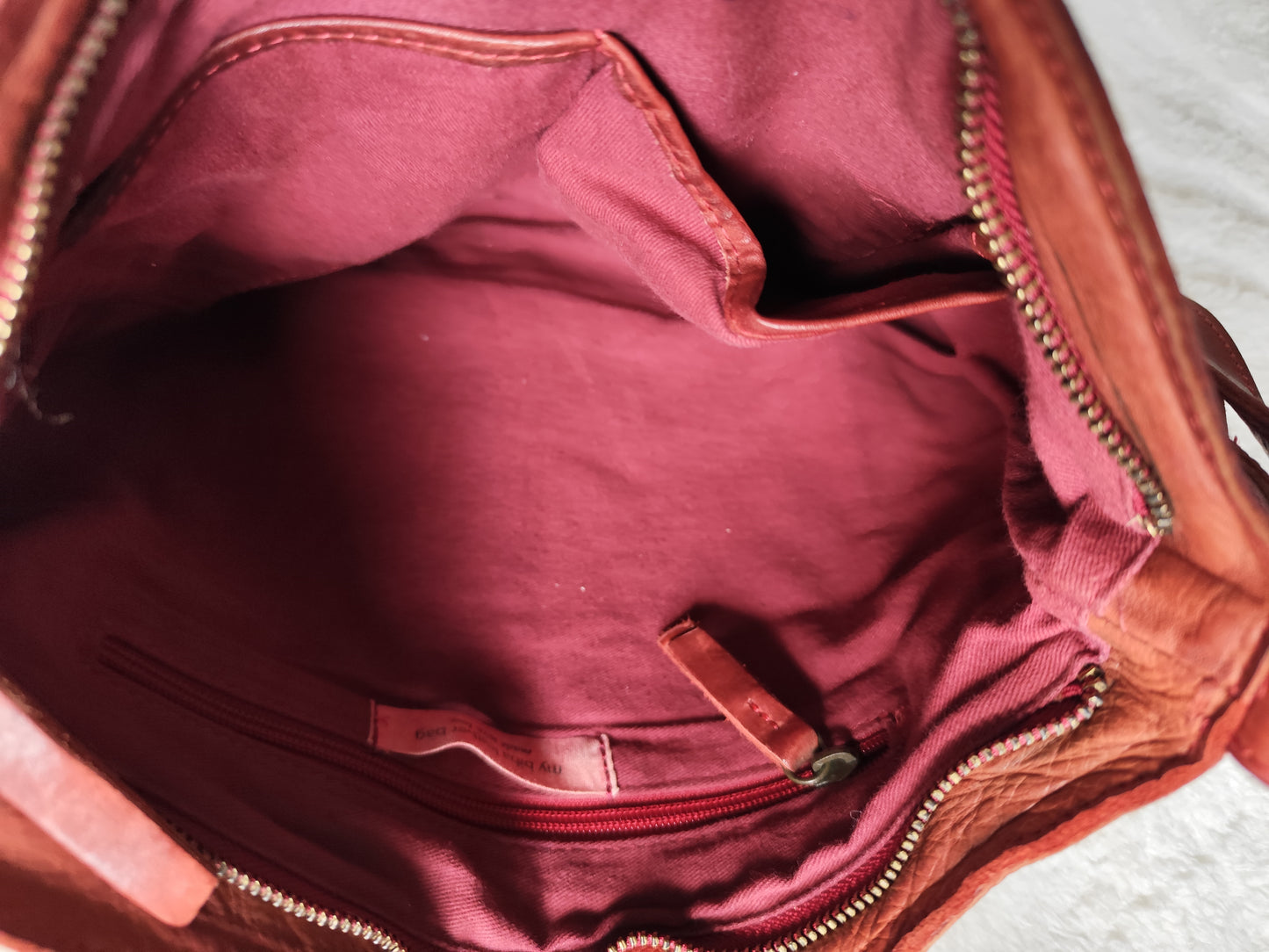 Sac bandoulière Biba en cuir tressé marron