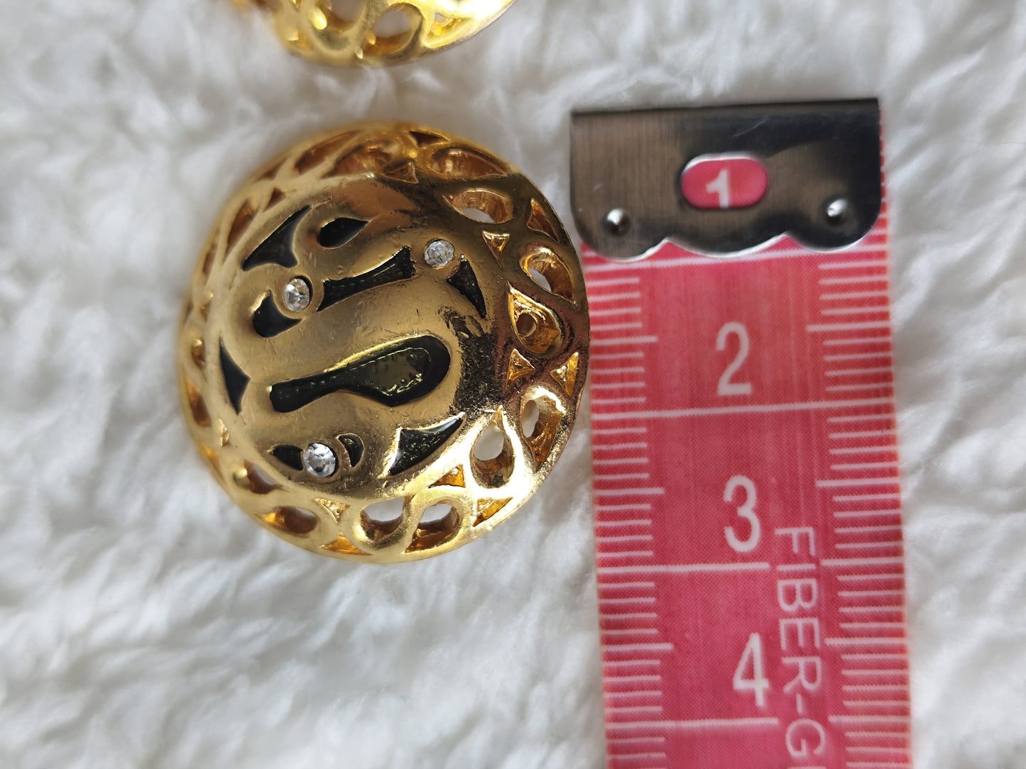 Boucles d’oreilles clip-on métal doré ajouré