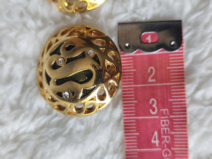 Boucles d’oreilles clip-on métal doré ajouré