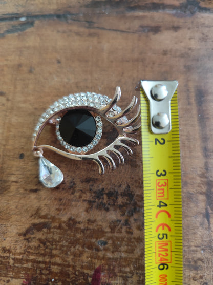 Broche vintage œil surréaliste dorée strass et larme pendante