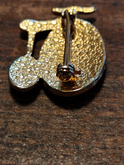 Broche vintage vélo grand-bi dorée et nacrée